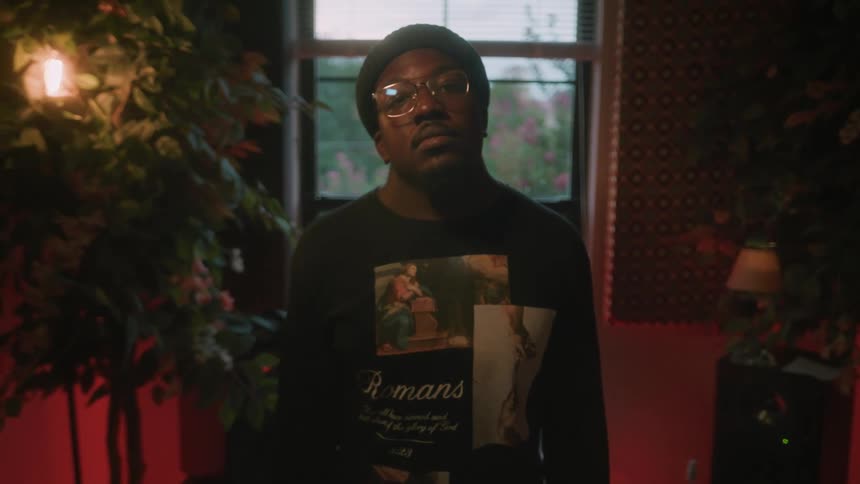A man looks up in the room