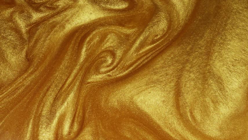 Gold liquid paint swirling