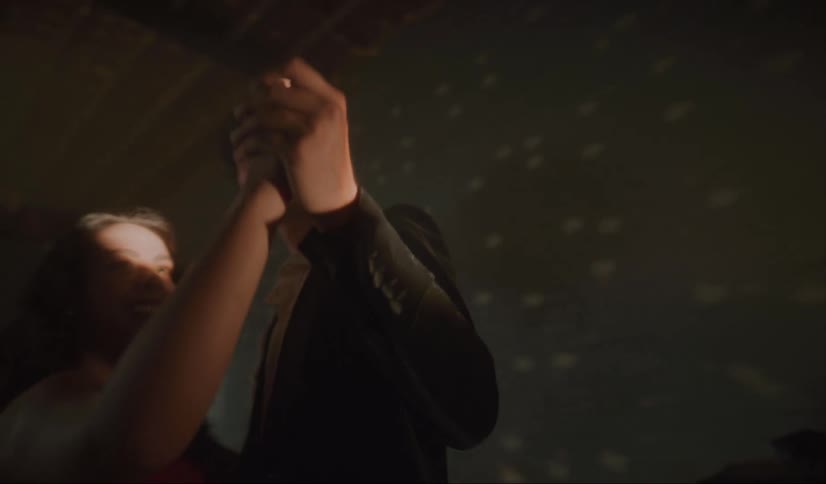A man and woman dance together