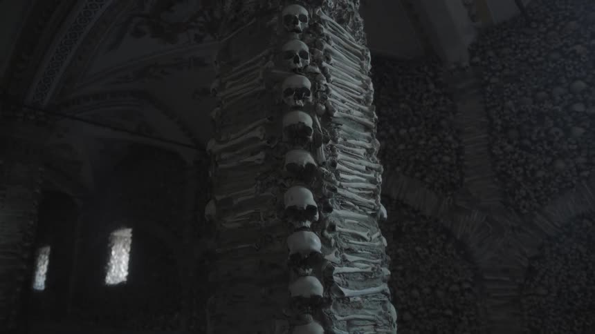 A pillar made of bones and skulls