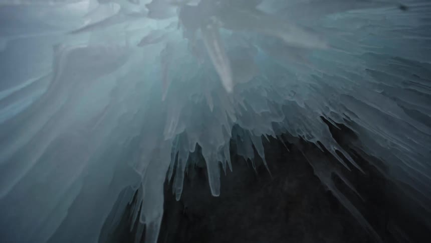The sun shining down on icicles, close-up