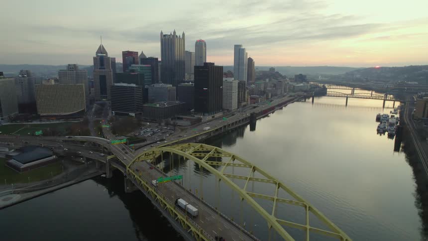 Aerial view of a downtown city is displayed at dusk