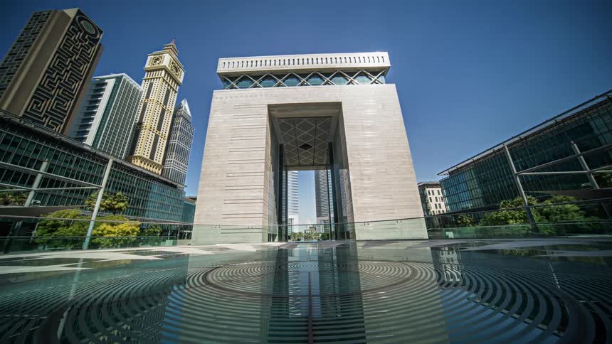 Exterior view of difc gate building with skyscrapers in the background