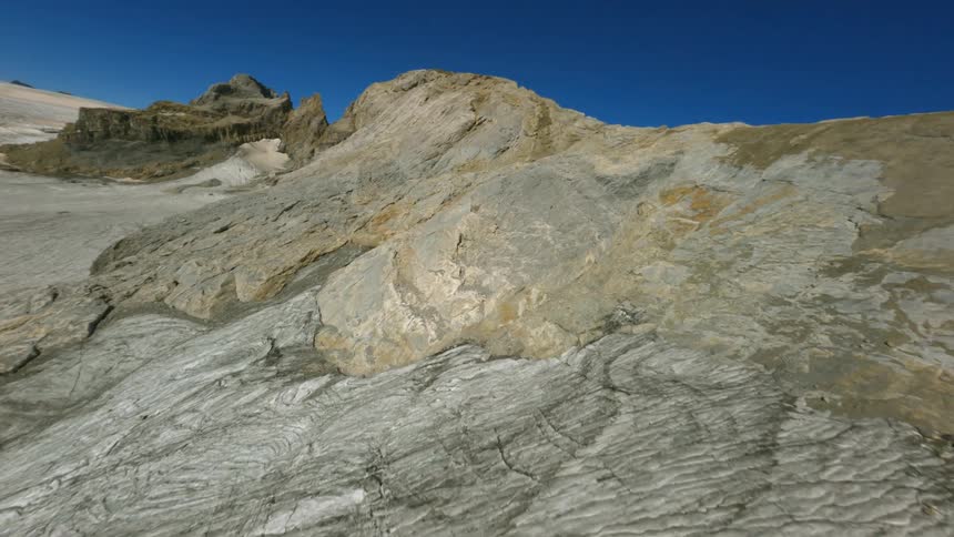 Aerial view of the mountainous landscape is displayed