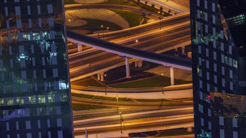 Time lapse of vehicles driving on roads in a city