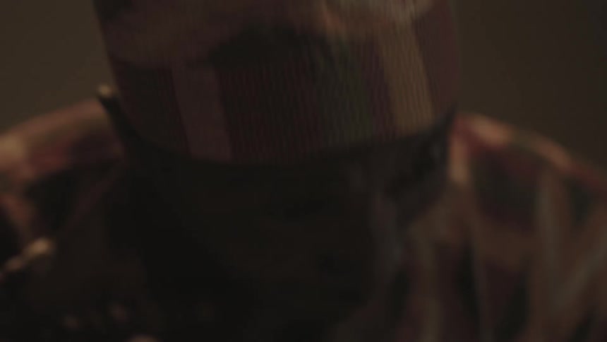 A man is drumming and moving around fast