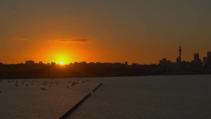 The sun is setting on the city