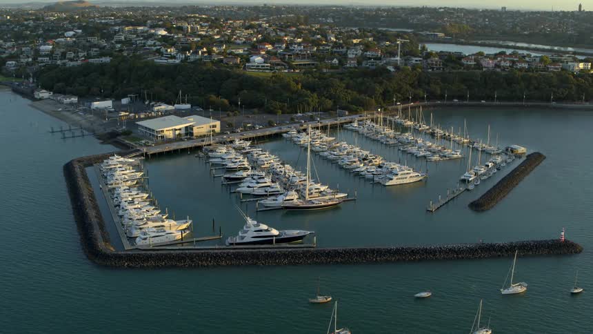 A marina on the coast of a city during the day