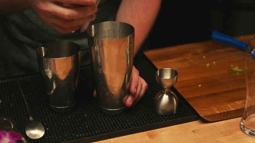 A bartender making drinks