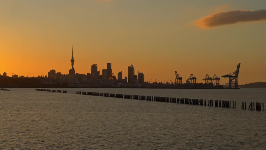 The sun is setting on the city