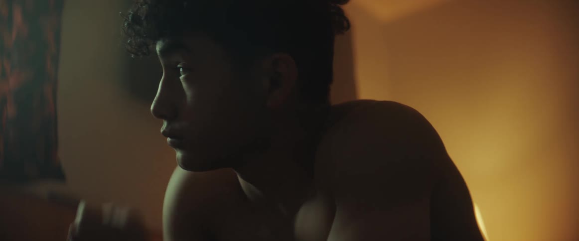 A view of a person sitting in a room