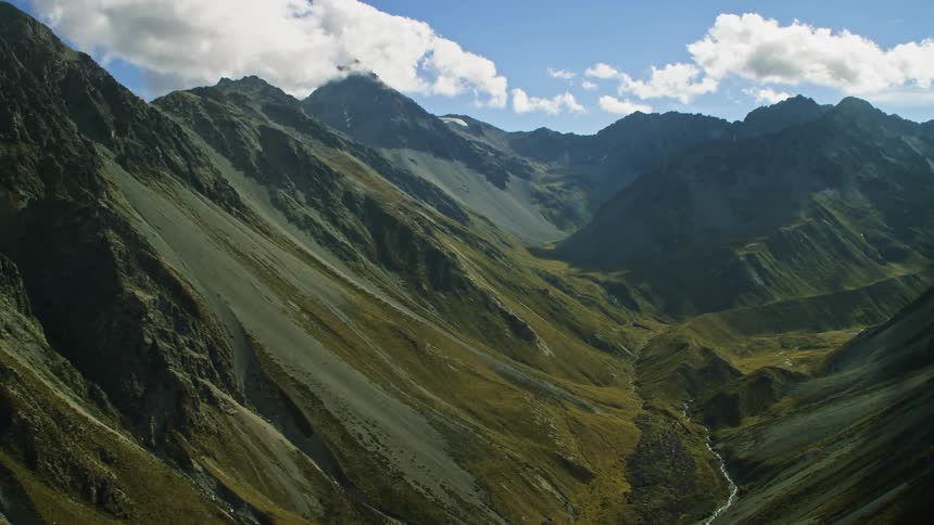 The tall mountains are all rocky and dramatic