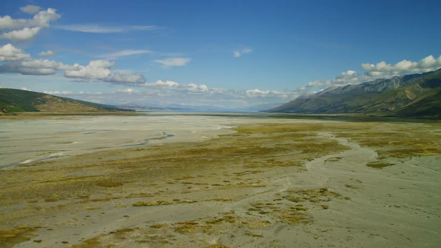 Streams of water at the base of mountains