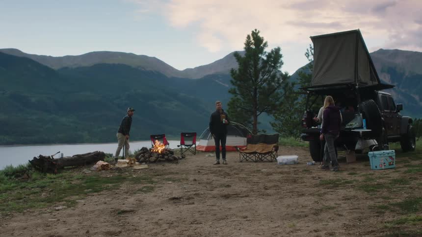 A group of people camping outside
