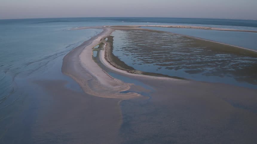 Small islands stretch in the water below