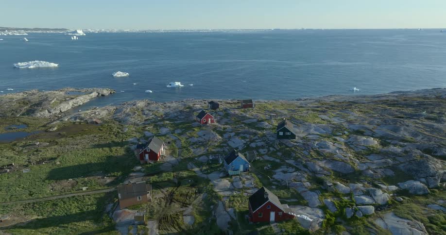 Ice is in the ocean near the small town
