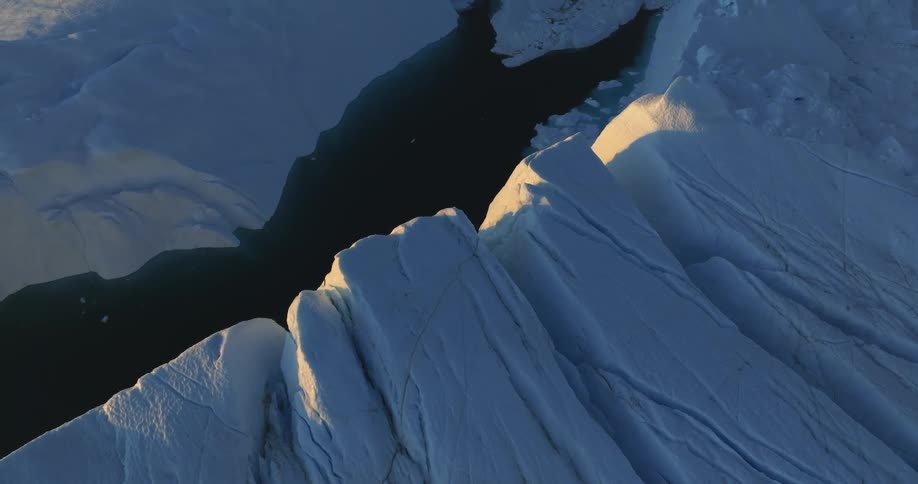 Aerial view of large mass of ice that floats in the sea