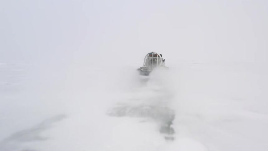 The vehicle is traveling over the ice