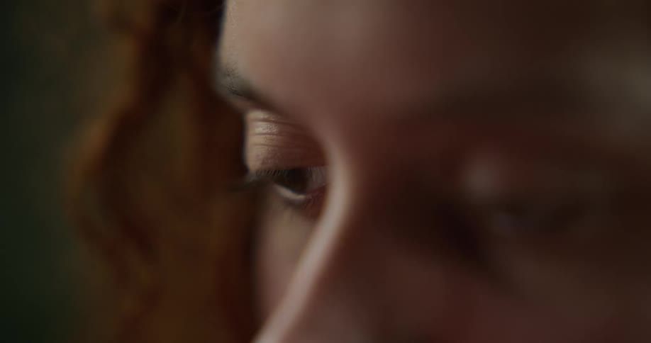 A red headed womans lips and face