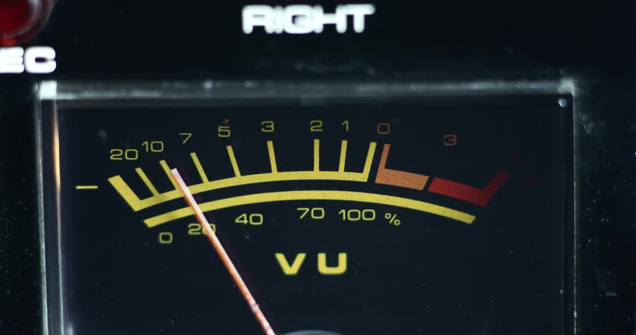 Needle moves across vu meter arc to indicate right volume unit