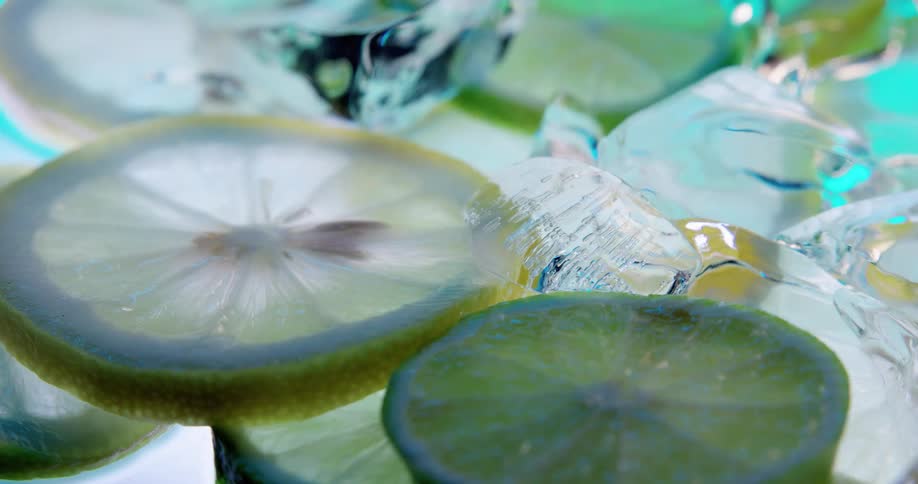 Ice and fruit float in the water