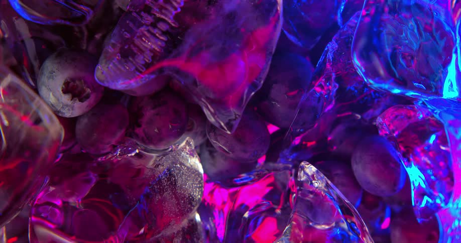 A pile of blueberries and ice cubes