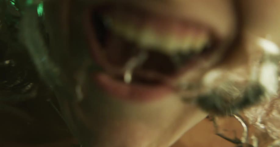 A woman screams after sticking her face underwater