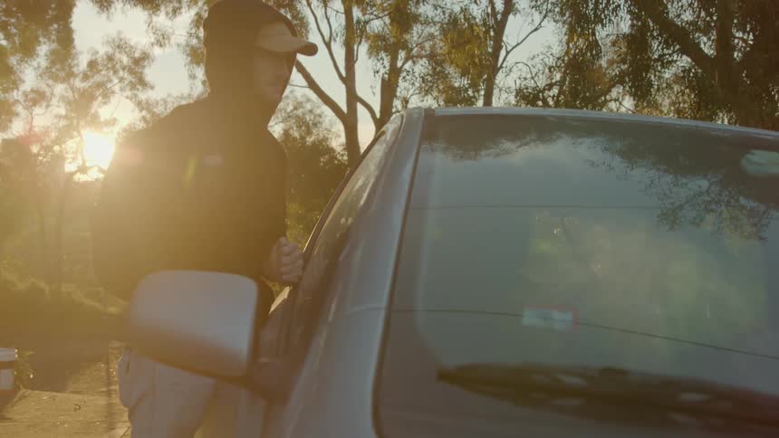 Man breaks into parked car and gets inside