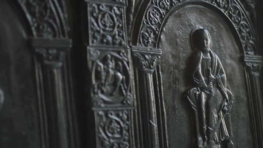 Saints carved into the walls of a room