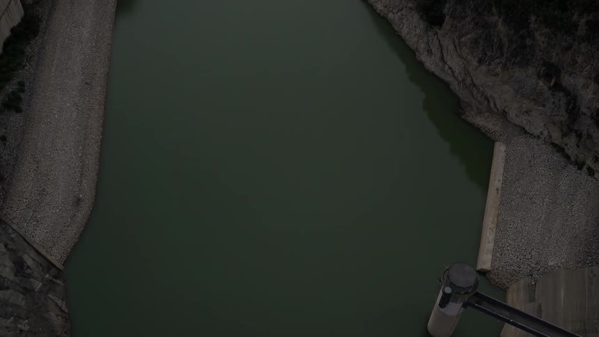 A dam holding back river water