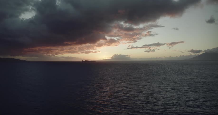 Heavy clouds are over the ocean