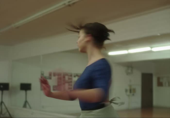 A woman is dancing ballet