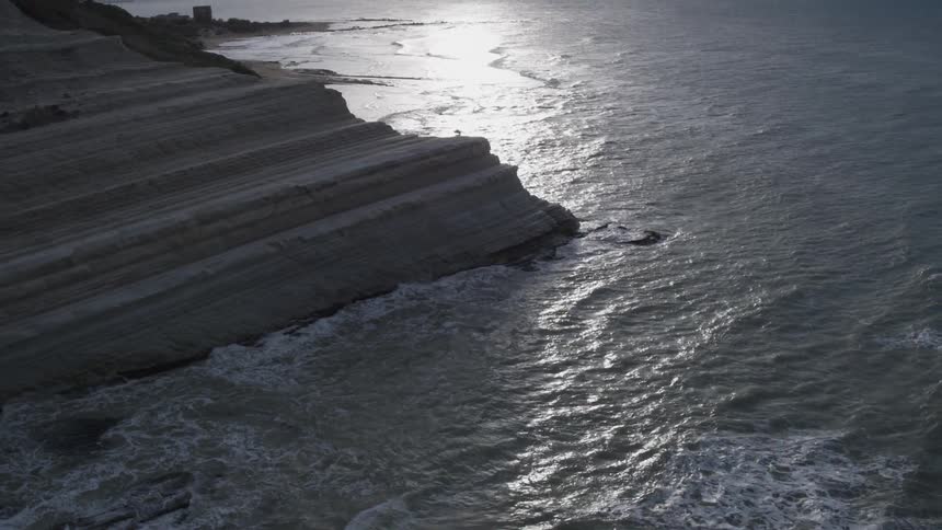 Waves crash on a mountain shore