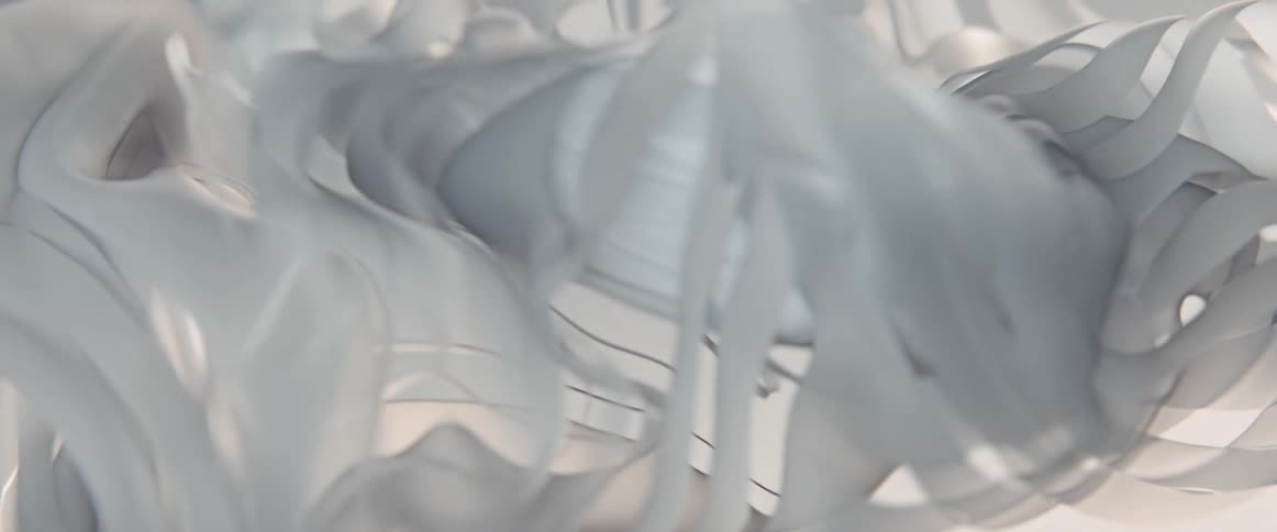A white curtain blows from a breeze