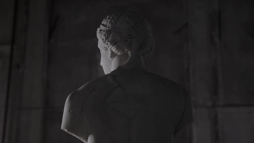 View of the back of a statue in an ancient building