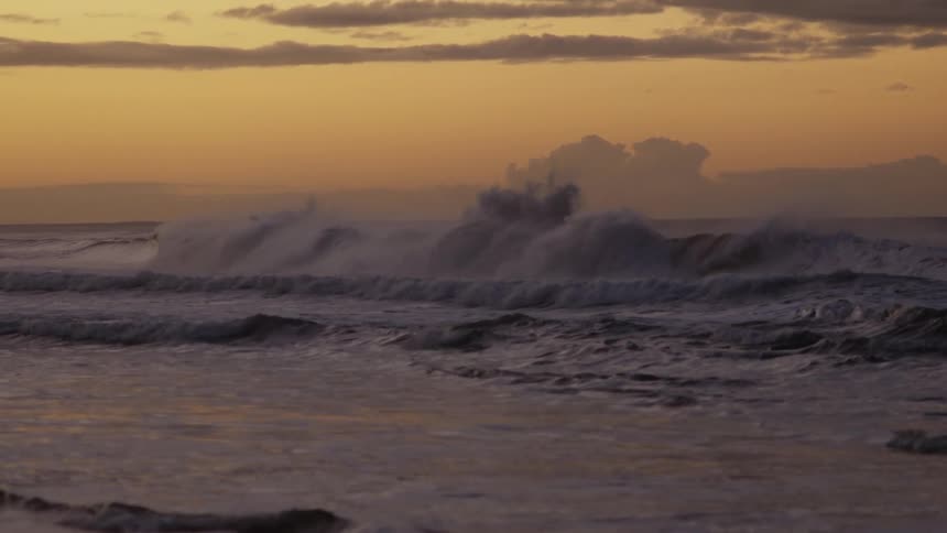A view of waves crashing on the shore