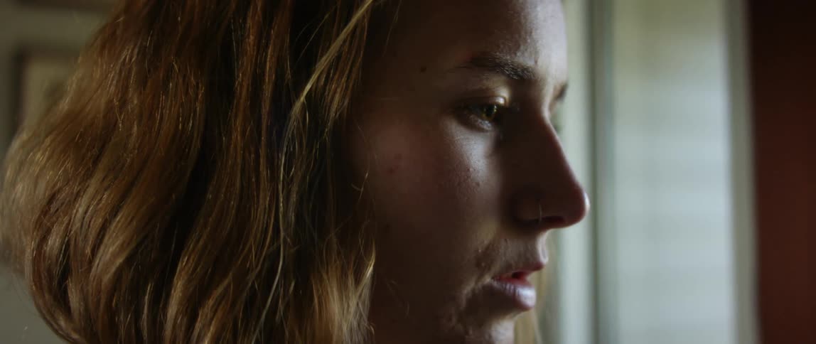 Close up view of a woman indoors is displayed