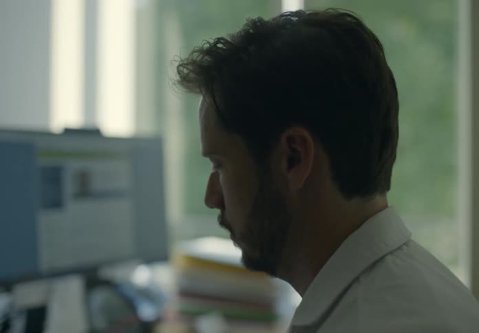A man is working in his office during spring