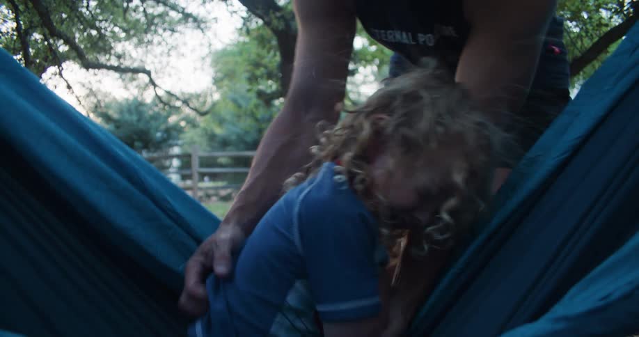 A father and daughter playing