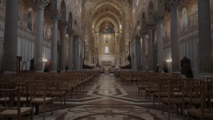 A large cathedral with individual chairs set up as the pews