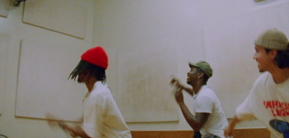 Male dancers practice routine in dance studio