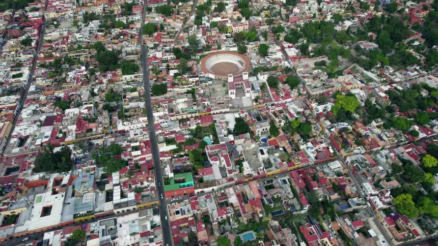 Aerial view of a suburban city is displayed