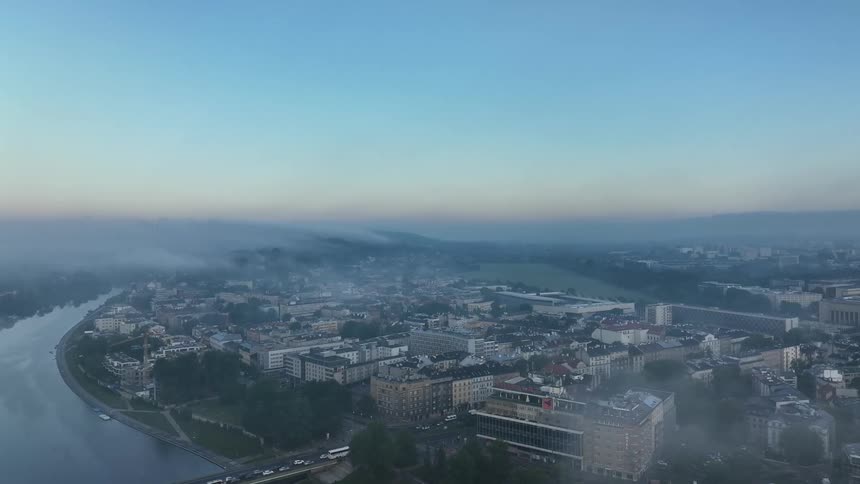 Buildings in a city on a hazy morning