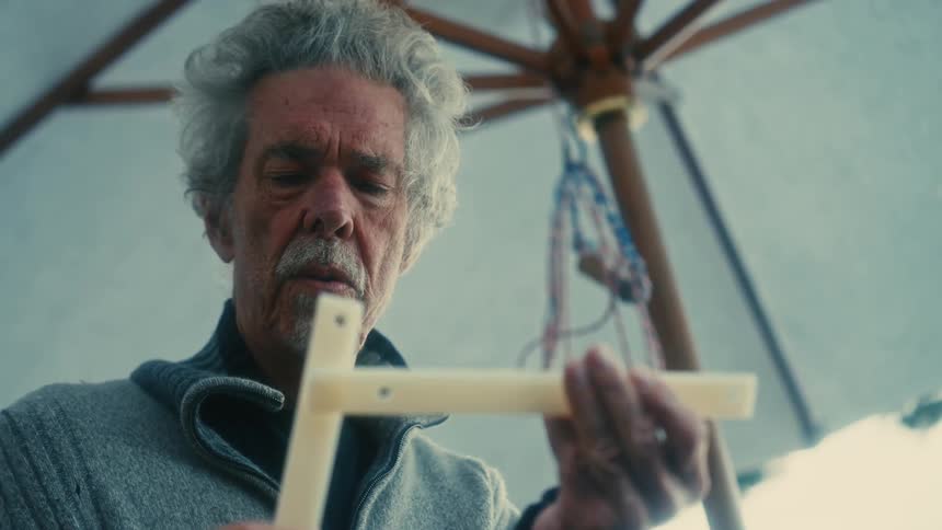 A man is examining an object