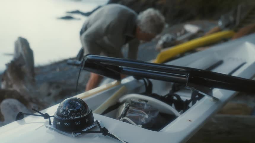 A person working on some boats
