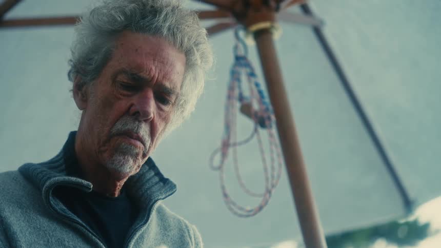 A man is working on his boat
