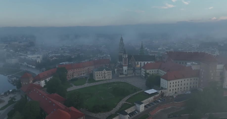 Aerial view of buildings in a city is displayed