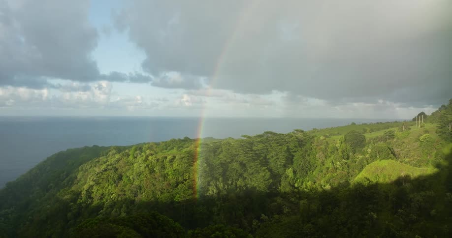 A rainbow is over the mountain range