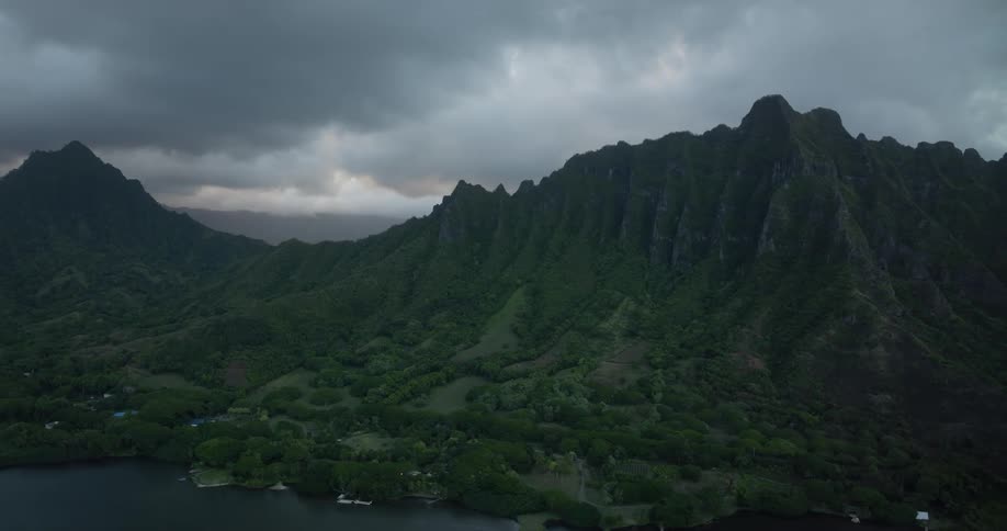 A landscape views of a waterway and hills on the shore