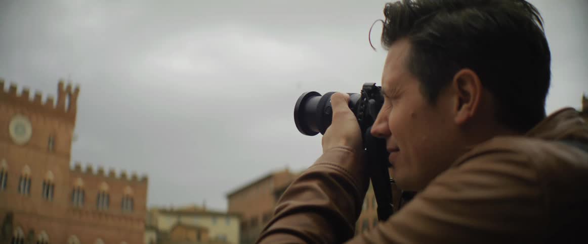 A man using a camera